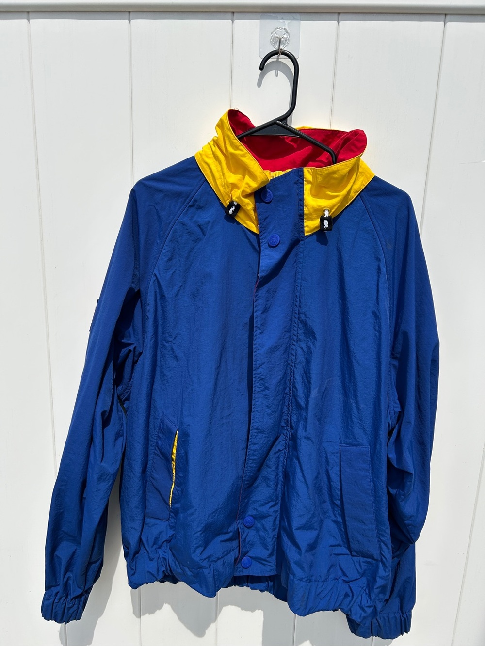 Tommy Hilfiger Blue Jacket with Yellow and Red Accents